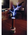 Pulsed Tesla coil in a living room, a YT short by Alistair Bostrom